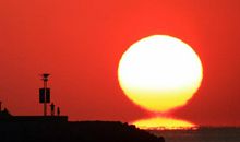 描写太阳下山的成语