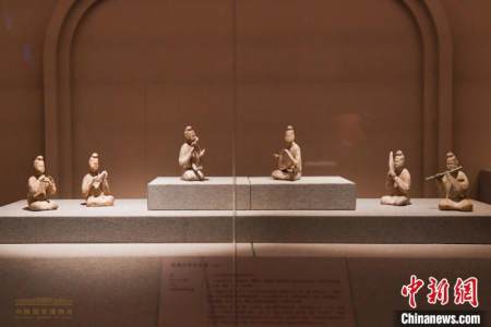 把胡琴放在你的嘴里